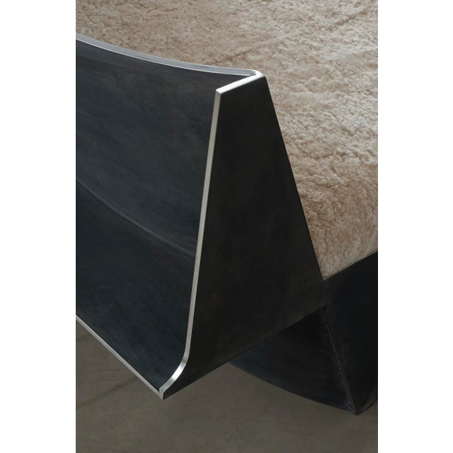 This is a collectible piece made from sheepskin and patinated aluminium. Labeled by Maker,Numbered