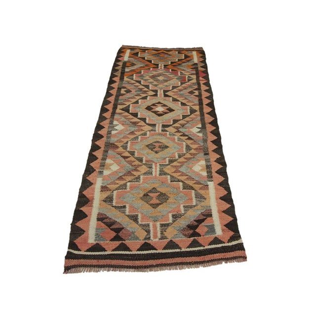 Vintage decorative handwoven kilim runner from South Eastern Turkey.Approximately 45-55 years old. In very good condition.