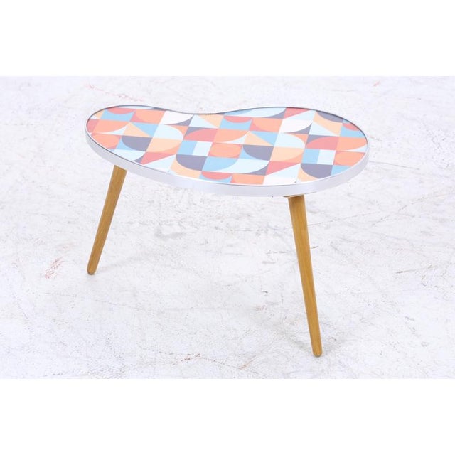 Beautiful vintage kidney-shaped table with colorful pattern High-quality workmanship • Material: Wood • with colorful...