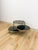 This extraordinary vintage Milo Baughman style tubular chrome 3-tier coffee table with swivel action and smokey glass is a...