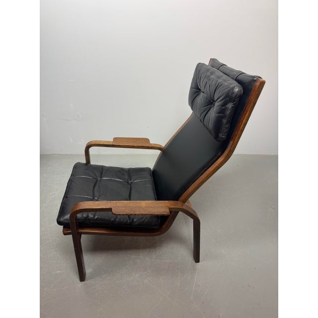 Mid-Century Design 'Lamino' Black Leather Lounge Chair Model P583 by Yngve Ekström for Swedese, Sweden 1970s. This iconic...
