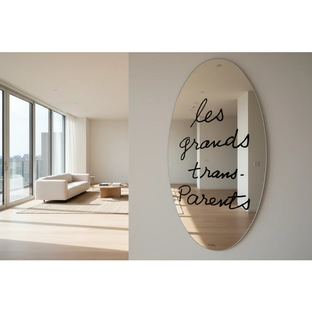 A captivating mirror that introduces an artistic dimension to any interior, its reflective surface enhanced by screen-...