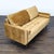 This stylish 3-seat sofa features a soft mustard yellow velvet upholstery with classic tufted details and two matching...