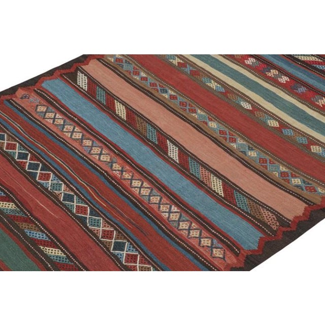 This vintage 5x7 Persian Kilim is believed to be a Shahsavan tribal rug. Handwoven in wool, it originates circa 1950-1960...