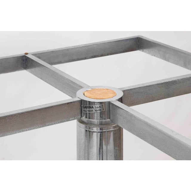 André square table, designed by Tobia Scarpa for Gavina, with smoked glass top and chromed steel frame. The André table by...