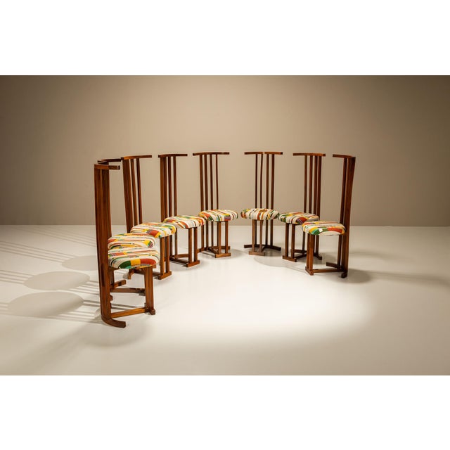 A rare and sculptural set of dining room chairs attributed to the Italian architect Filippo Monti. This set captures the...