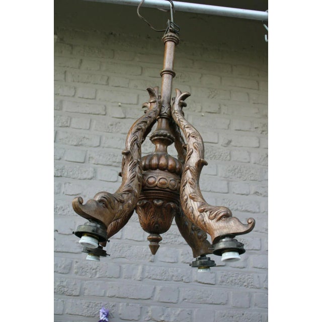 Parisian Estate. c1920's French Art Deco and Neoclassical in style Artisan Carved Detailed Wood Chandelier - Sea Creature/...