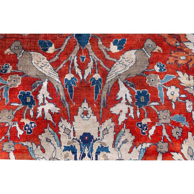 One rarely gets to face the wonder of art and craft comparable with this antique Persian rug made in the renowned weaving...