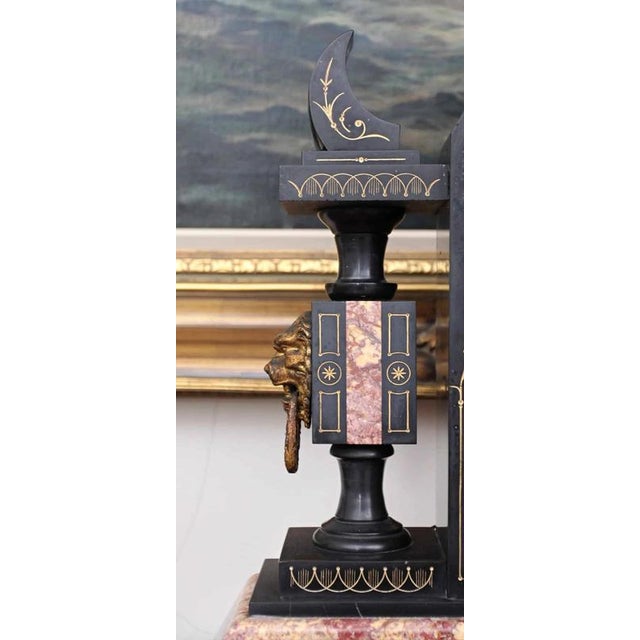 Fireplace clock from the 1920s decorated with cast brass and polished marble. Fine workmanship. Very heavy. In good...