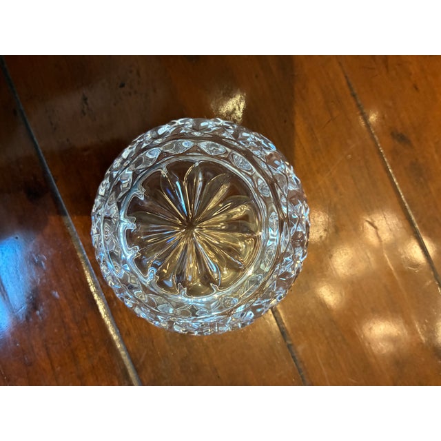 This is a lead crystal bowl made from molded, not cut, glass. Probably intended for use originally as a finger bowl. Could...
