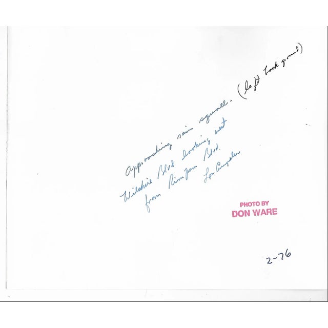 1976 black and white photograph by Los Angeles photographer Don Coleman Ware (1921-2006) of an approaching rain storm...