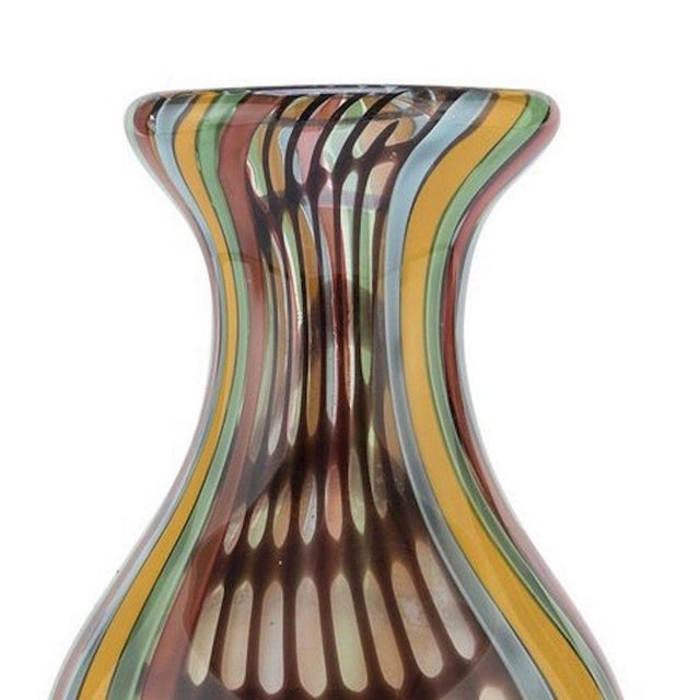 Rainbow glass vase is a very rare vase realized by Italian Manufacture in the 1970s. A beautiful vase with vertical...