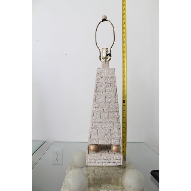 This listing is for ONE awesome vintage 80's postmodern table lamp. Pyramid shaped faux Mactan stone textured pattern in...