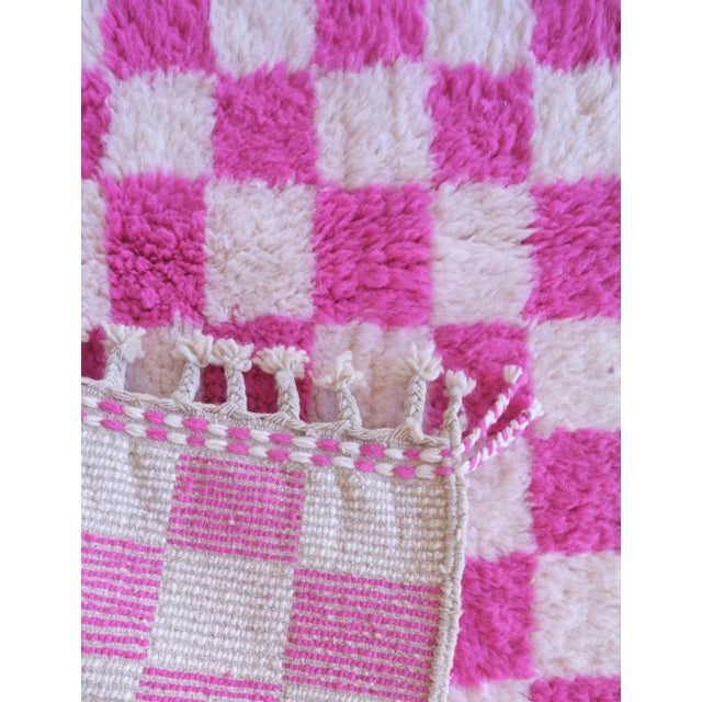 Add a pop of color to any room with our Checkered Neon Pink Wool Rug. Handknotted with a vibrant fushia pink and white...