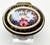 An oval Battersea Bilston English Enamel Love Motto Patch Box. The top has Two Love Doves and a Pink Rose in the center...