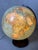 Large glass physics globe. Published by Columbus Verlag. Model: Globe Terrestre "Colomb." Language: French. with a...