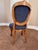 I love the blue color. The sophicated wood carved deco is great.