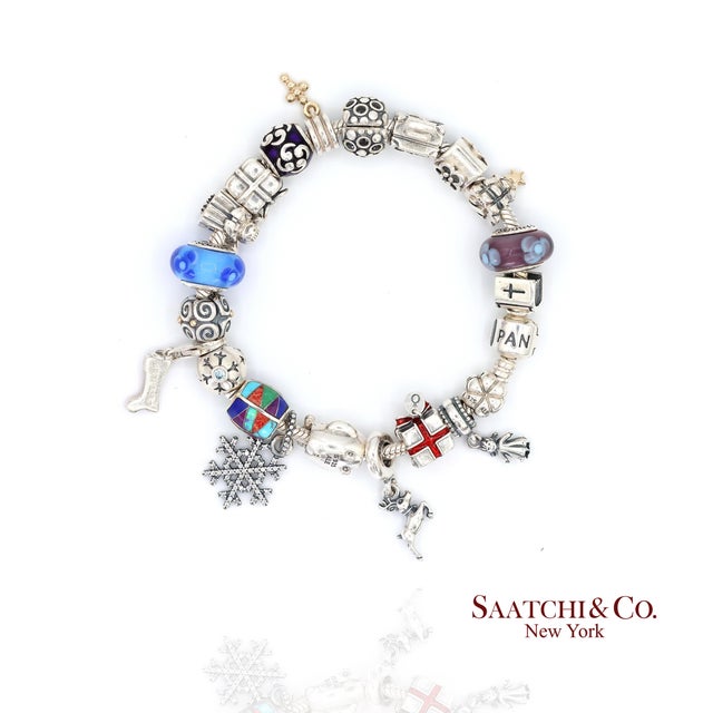Sterling Silver Charm Bracelet Metal Type: Sterling Silver Total Item Weight: 86.2 Grams Length: 8.0 in Width: 15.0 mm...