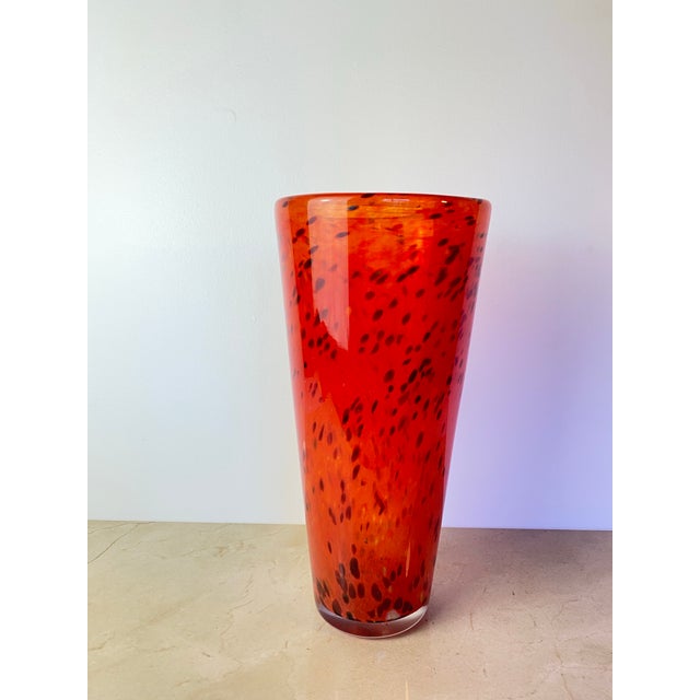 Mouth-blown glass vase by Henry Dean, a European glass house known for bold, hand-finished mottled colorways. This example...