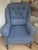 A stylish mid-century inspired wingback armchair, offering both comfort and versatility in design. Upholstered in a...