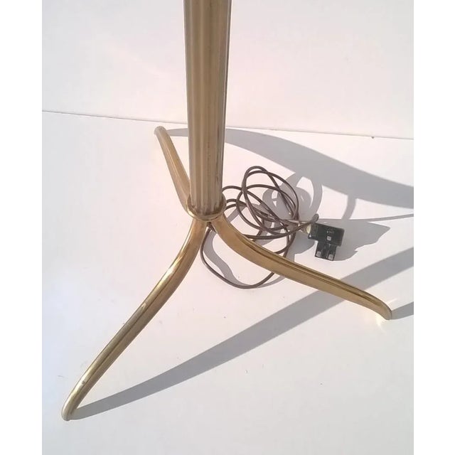 Oscar Torlasco designed this rare floor lamp for Lumi,1950s. Features a brass rod and is labeled by the company. Very good...