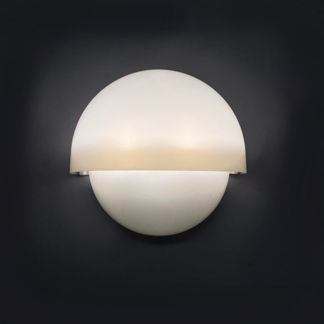 Italian mid-century modern plastic wall lamps Mania by Vico Magistretti for Artemide, 1960s Pair of Mania wall lamps with...