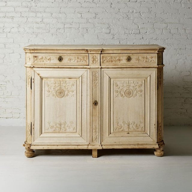 This exquisite 19th Century Bleached Oak Belgian Server showcases timeless European craftsmanship with its beautifully...