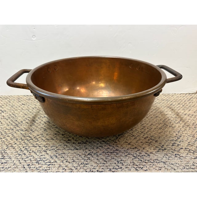 Large heavyweight antique copper 'chocolate pot', a heartwarming copper kettle having round bottom with iron handles. Used...