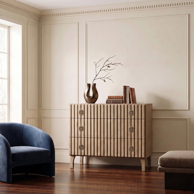 This solid mahogany dresser is distinguished by the textural carving on the faces of its three drawers. The unique ribbed...