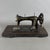 A rare and charming vintage table-top sewing machine, produced by the renowned German manufacturer Wertheim (Frankfurt am...