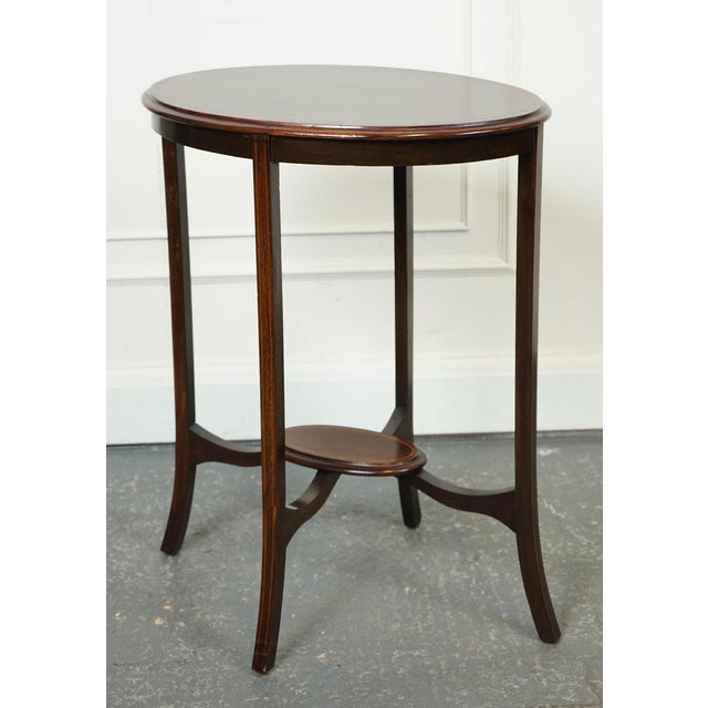 Lovely Oval Hardwood Side Plant Table. Measurements Height - 76.5 cm Width - 58.5 cm Depth - 42.5 cm Please note all...