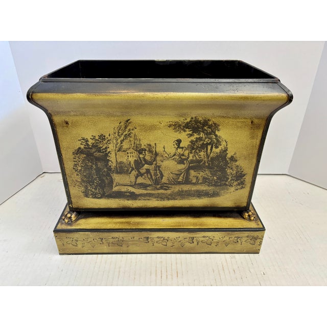 Classical Italian toleware planter, featuring a black-and-white pastoral scene and a classical brass lion's head pull and...