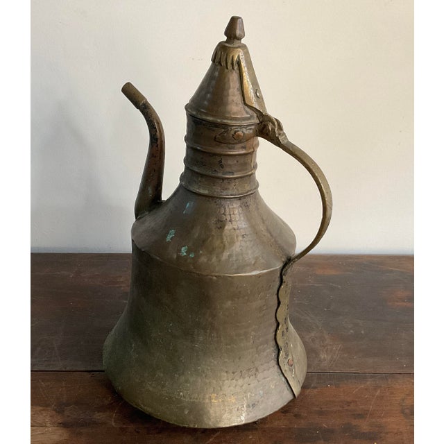 This is not merely a decorative object, but a testament to the masterful metalworking techniques and rich cultural...