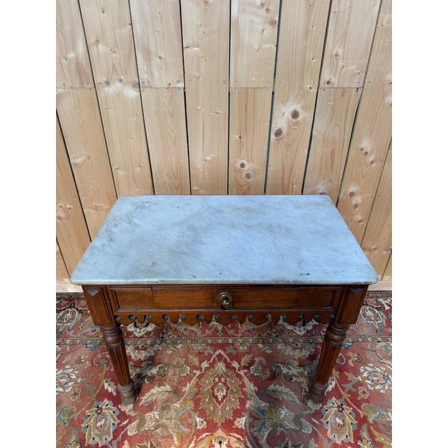 Restoration period butcher's block, first third of the 19th century, made of solid wood with a single drawer in the front....