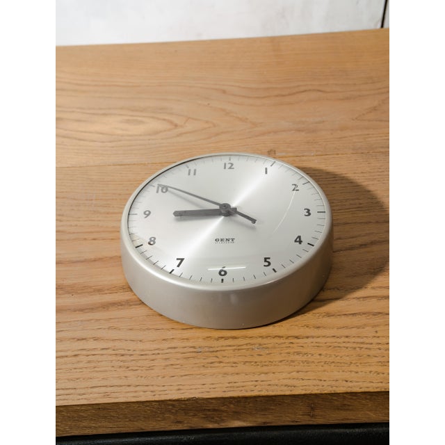 An original 1960s wall clock marked Gent of Leicester on the dial, left entirely untouched rather than restored. It still...