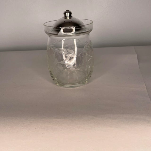 Antique jam jar without spoon. Sterling lid is marked Webster. Glass is in great condition. Silver has been polished but...