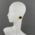 Karl Lagerfeld Paris designed these lovely clip-on earrings. The pieces feature a round, gilt metal framing with texture,...