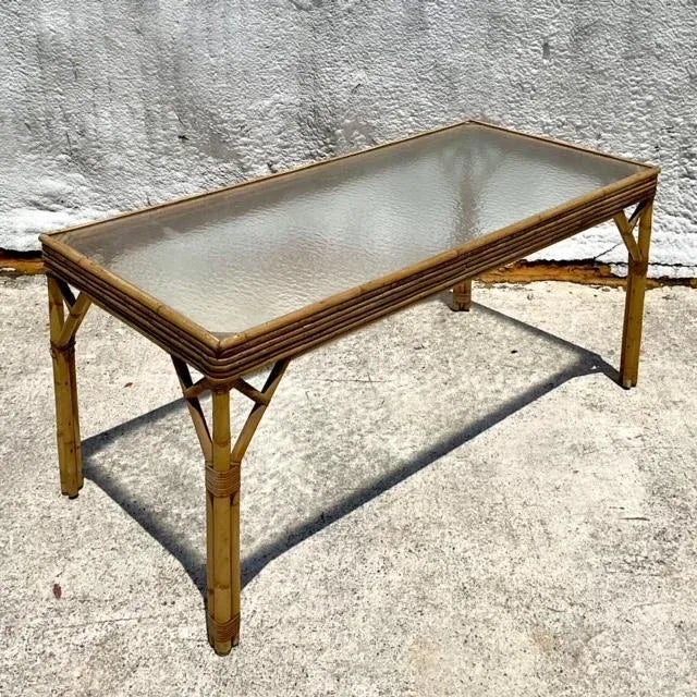 Embrace timeless American elegance with the Vintage Coastal Stacked Rattan Dining Table. This stunning piece combines...