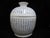 Large Chinese jar or pot with lid. White porcelain with balloon shaped jar with blue epitaph in calligraphy writing....