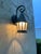 sconces are patinaed in green and charcoal, they appear to be copper metal, they have a hammered finish and have been...