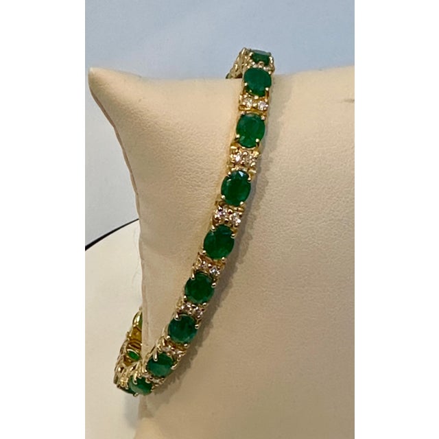 This exceptionally affordable Tennis bracelet has 17 stones of oval Emeralds . Each Emerald is spaced by two diamonds ....