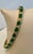 This exceptionally affordable Tennis bracelet has 17 stones of oval Emeralds . Each Emerald is spaced by two diamonds ....