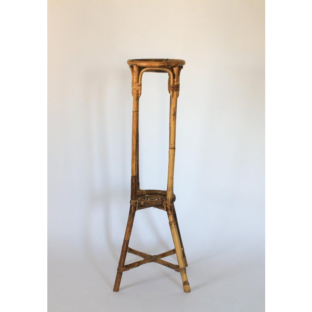 Vintage ratan / bamboo two tiered plant stand. Made in the Philippines. The inside of the top tier measures, 7.75"diam....