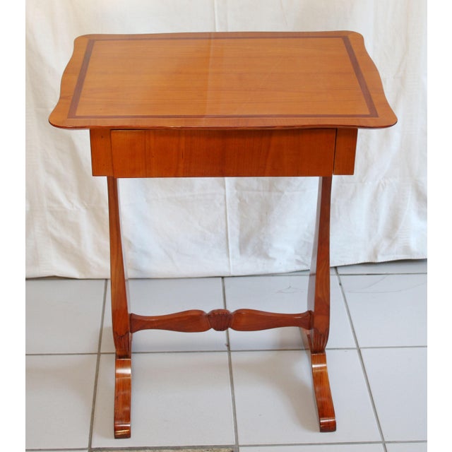 Biedermeier Sewing Table Biedermeier sewing table made around 1830. Spruce wood, cherry veneer. Solid cherry wood carvings...