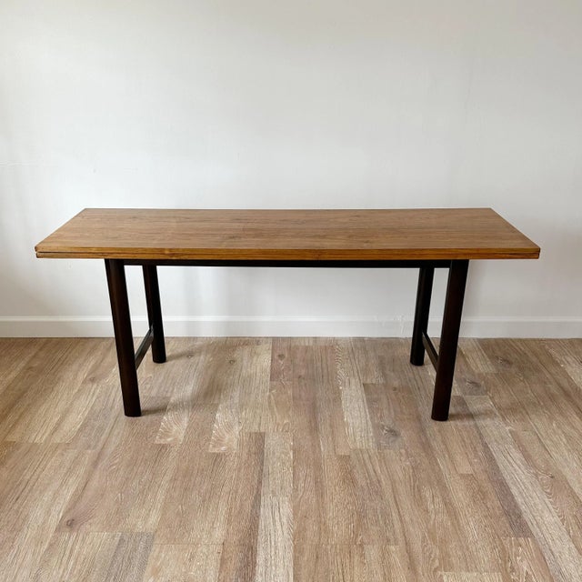 Versatile flip-top console table to be used as console or small dining table. 20 inches deep closed,opens to 40 inches....