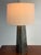 Design Plus Gallery presents the Caleb Table Lamp from Bassett Furniture. The fluted, obelisk-shaped base displays mercury...