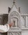 This 19th century Gothic decorative object from France is finished in antique white, worked in wood. Its design carries...