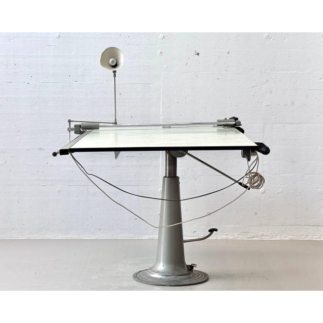 A rare professional drafting table, manufactured in sweden by nike eskilstuna. The design combines industrial...