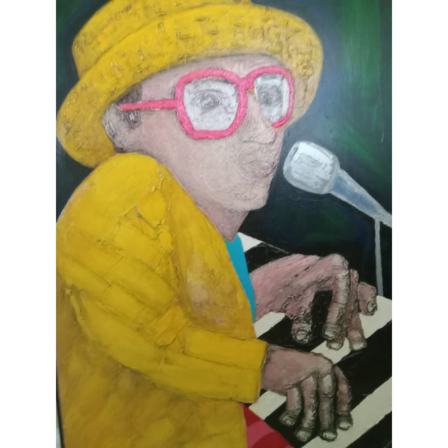 Origional artwork done by my father, an artist. Bring the Rocket Man into your space with this vibrant Elton John...