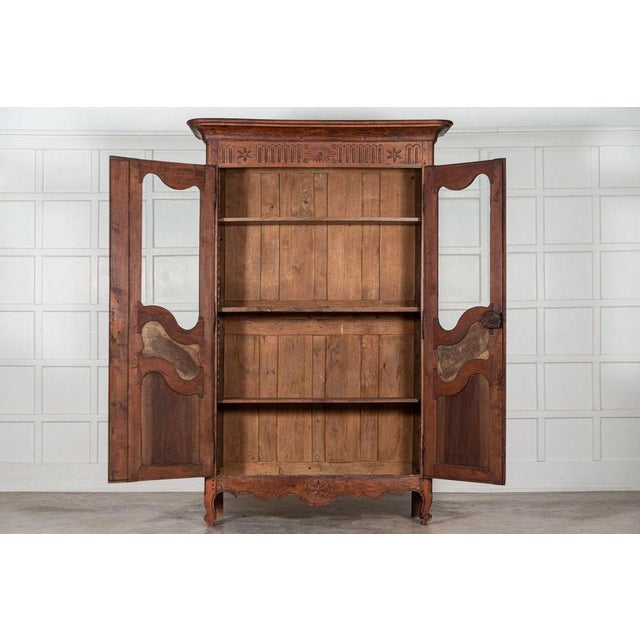 Circa 1800 19th century French glazed fruitwood armoire / vitrine Sourced from the South of France. Measures: W158 x D45 x...